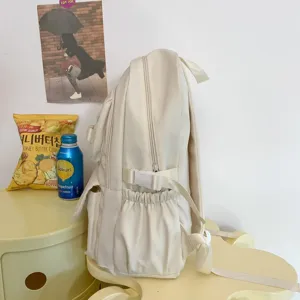 Zaino beige minimalista casual per scuola, studenti e viaggi giornalieri con grande capacità.