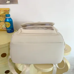 Zaino casual bianco con tasca trasparente, grande capacità ideale per scuola e uso quotidiano.