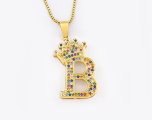 Close-up of the gold-plated crown letter B pendant necklace set with colorful zirconia.
