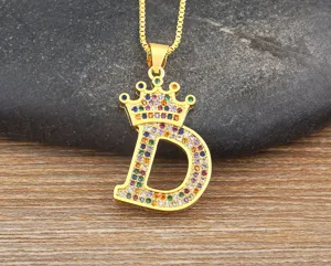 Close-up detail of the colorful zircon letter D crown pendant necklace, elegant and sparkling.