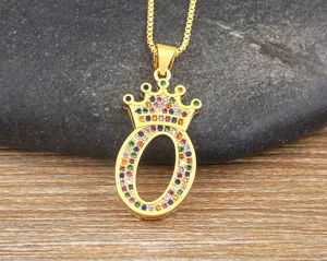 Close-up detail of the fashion letter O pendant necklace with sparkling colorful cubic zirconia crown.