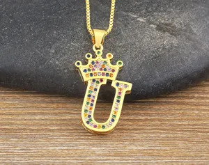 Gold-plated colorful cubic zirconia letter U crown pendant necklace closeup detail view