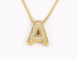 Gold plated letter A pendant necklace with sparkling micro-pave cubic zirconia stones.
