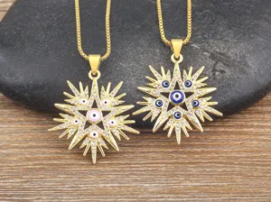 Stunning evil eye star pendant necklace detailed closeup, gold plated sparkling rhinestone.
