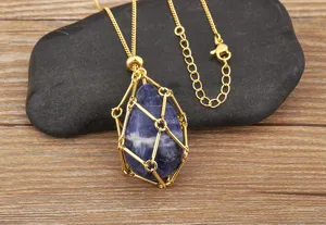 Detailed shot of irregular natural blue crystal pendant in gold plated net pocket necklace.