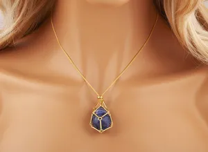 Gold plated natural crystal cage pendant necklace adjustable bamboo chain detail.