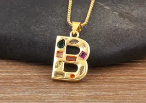 Detailed close-up of gold-plated initial letter B pendant with colorful cubic zirconia.