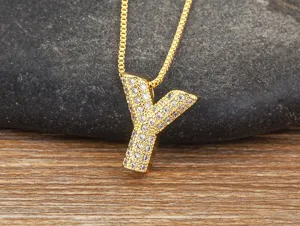 Detailed close-up shot of the sparkling pavé zircon letter Y pendant necklace surface.