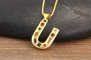 18K gold plated letter U pendant necklace featuring multi-colored cubic zirconia stones.