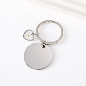 Stainless steel heart mustard seed keychain detail view, durable metal keyring gift.
