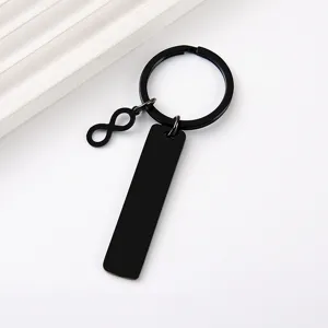 Llavero de acero inoxidable negro en blanco con dijes de infinito para grabar laser regalos.