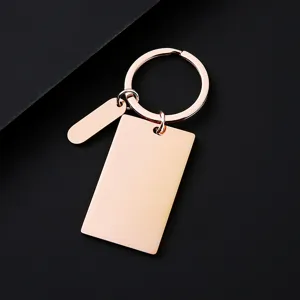 Rose gold blank stainless steel keychain detail, custom laser engraving metal pendant accessory.
