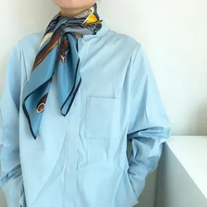 Silk scarf for women, elegant blue neckerchief with classic equestrian print, fashion accessory.