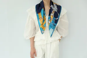 Elegant silk square scarf featuring a stylish belt and buckle print, perfect for luxury fashion.