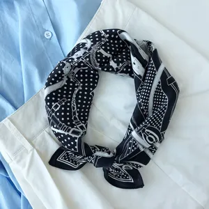 Silk scarf detail shot, 53cm black and white polka dot belt pattern mulberry silk fashion accessory.