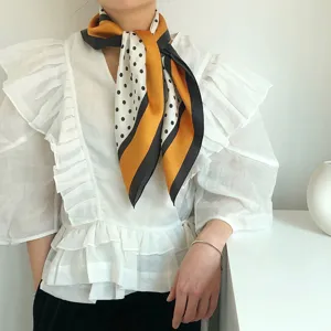 Silk polka dot square scarf detail, vintage style mulberry silk neckerchief accessory.