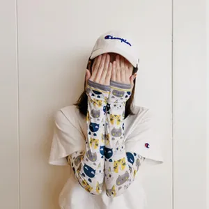 Detailed view of cute cat print ice silk sun protection arm sleeves, breathable summer.
