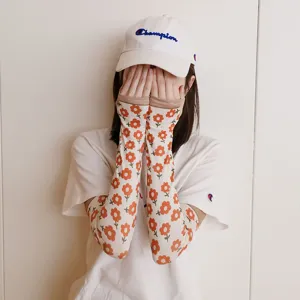 Mangas de hielo de proteccion solar con estampado floral para mujeres, cubrebrazos frescos.