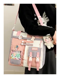 Sac à bandoulière en toile, grand cabas d'étudiant, cartable de grande capacité avec pendentif.
