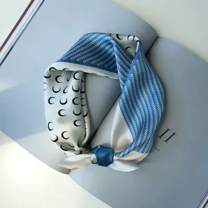 Elegant blue and white silk square scarf with trendy crescent moon and geometric print.