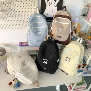 Cute Japanese style canvas school backpack multi-color set with sweet design for student daily use.