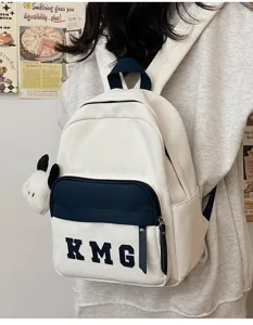 Mochila escolar ligera para niños con lindo colgante de perrito para viajes y estudios.