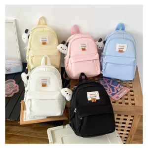 Zaino mini carino da donna e studenti, borsa casual per viaggi scolastici con ciondolo a forma di cane.
