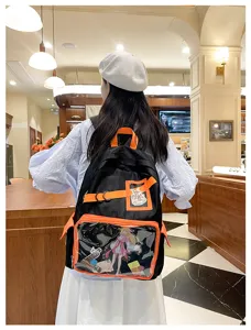 Unisex itabag rugzak met doorzichtig PVC venster, zwart en oranje ontwerp voor anime.