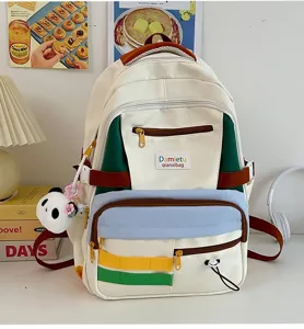 Zaino per studenti colorblock carino e alla moda di grande capacità con ciondolo panda.