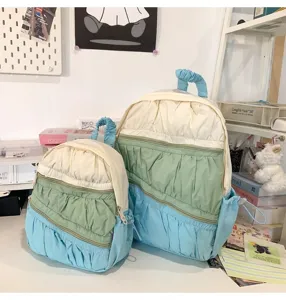 Mini zaino plissettato a torta, borsa scolastica leggera e casual per viaggi e studenti.
