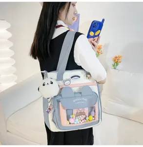 Bolso bandolera de lona para mujer, bolso grande de estudiante para libros con detalles.