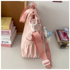Roze ribfluwelen ita tas grote capaciteit crossbody schoudertas studenten detailweergave