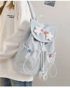 Light blue casual backpack for women and students with cute plush star pendant details.
