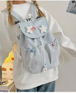 Cute Japanese style casual backpack with star plush pendant and double front pockets.