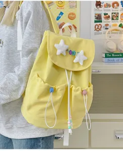 Japanese cute yellow canvas backpack with plush stars and drawstring for school girls and teens.