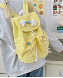 Cute Japanese style yellow canvas school backpack for teenage girls lightweight casual daypack.
