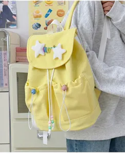 Japanese casual cute yellow canvas backpack for students with stars and colorful beads design.