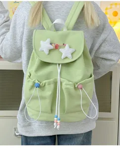 Japanese style casual backpack for girls, cute lightweight school bag with plush star decorations.