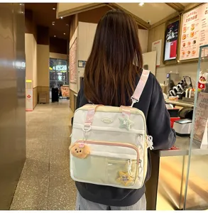 Sac à dos en toile polyvalent pour étudiants avec de jolies peluches, grande capacité quotidienne.