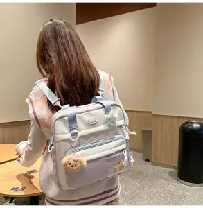 Joli sac à dos en toile multifonctionnel pour filles, cartable avec joli pendentif chien.