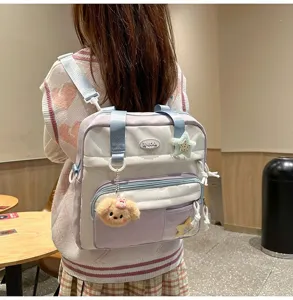 Sac à dos d'étudiant multifonctionnel mignon avec charm de chiot et poches spacieuses.