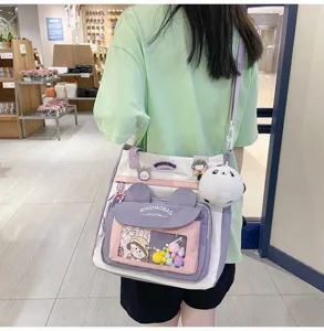 Lindo bolso cruzado de lona con varios bolsillos, gran bolso escolar para estudiantes con colgante.