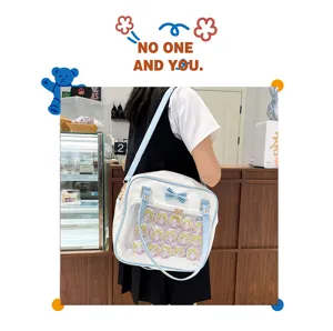 Cute bow ita bag transparent shoulder bag with anime badges for daily fashion use.
