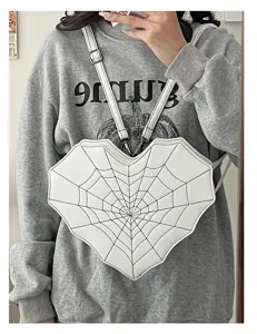 White heart spiderweb crossbody backpack, gothic style PU leather multi-function bag detail.