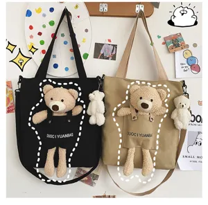 Bolso de lona bonito con detalle de bolsillo de oso de peluche, estilo japonés informal.