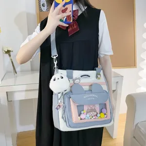 Bolso Tote de Lona para Mujer Gran Capacidad Bolso de Hombro Casual Bolso de Estudiante con Bolsillo Transparente y Colgante de Peluche