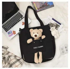 Bonito bolso de hombro de lona con osito de dibujos animados para mujer, casual.