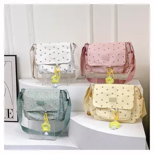Floral canvas messenger bag detail, multi-color large capacity student crossbody bag.