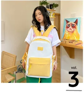 Detail view of a Japanese style canvas backpack in white and yellow, perfect for daily use.