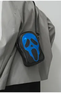 Sac bandoulière tendance unisexe avec motif de masque métallique effrayant pour usage.